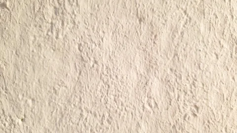 Close-up of a plastered wall, concrete wall surface, beige plaster. Stock Footage 318646509