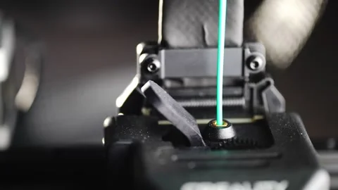 Close-up of plastic from the bay going to a 3D printer. Stock Footage 317153105