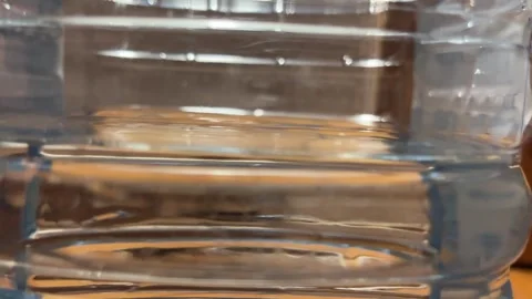 Close up plastic bottle texture and water reflections Video stock 344248607