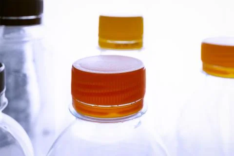 Close up plastic cap and bottle background for recycle concept Stock Photos