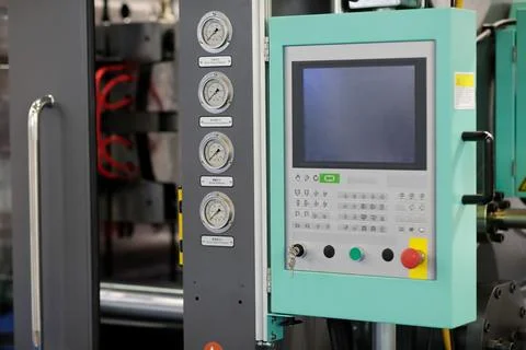 Close up of plastic injection moulding machine Stock Photos