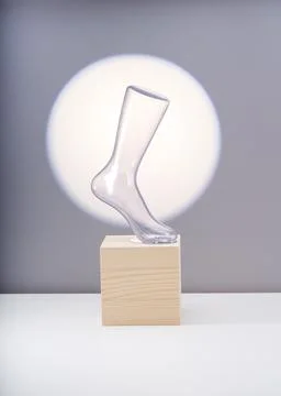 Close-up of a plastic model foot with socks on display stand Stock-Fotos