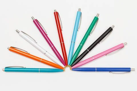Close-up plastic pens on a white background. Stock Photos