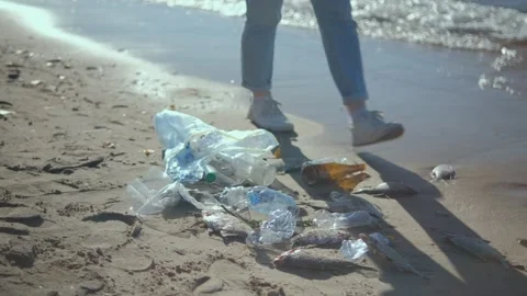Close up of plastic pollution on the beach. Plastic pollution and environmental Stock Footage 256925173