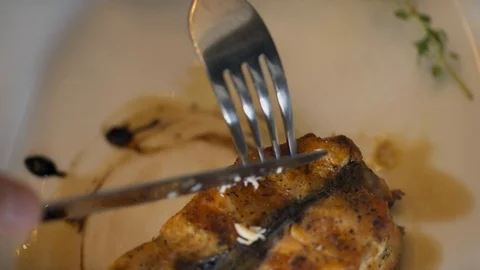 Close-up plate with baked fish inside restaurant. Video stock 78731450
