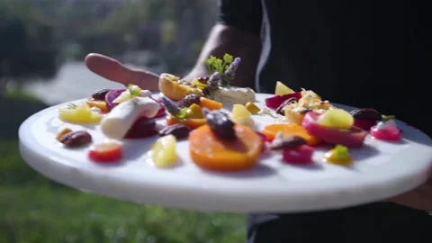 A close up of a plate of food on a table Stock Footage 155452801