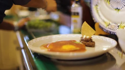 A close up of a plate of food on a table Stock Footage 155452970