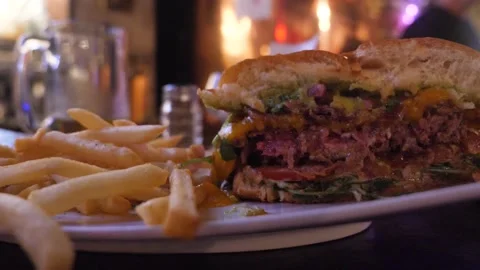 A close up of a plate of food on a table Stock Footage 155454486