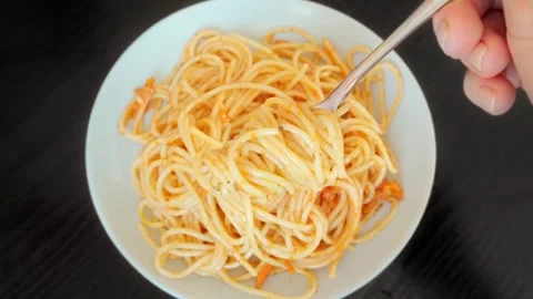 Close-up of a plate of spaghetti in sauce. Stock Footage 254465959