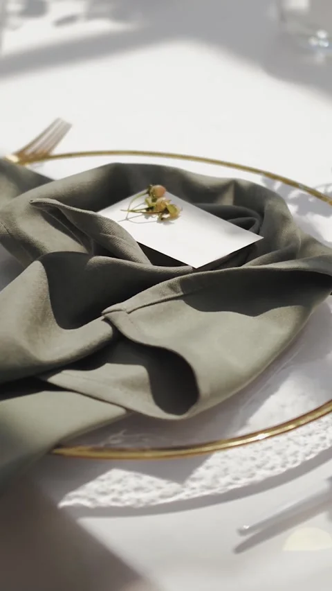 Close-up of a plate. Table setting at a wedding with a white plate on a white Stock Footage 307922442