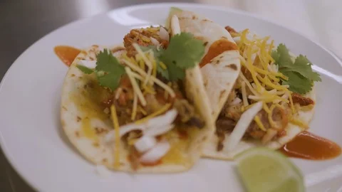 An up close plate of tacos Stock Footage 108597635
