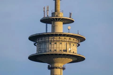 Close-up of the platform of a TV tower in front of a blue sky Stock Photos