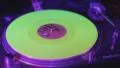 Close-up of platter rotating, playing on deck, lights strobing HD Footage
