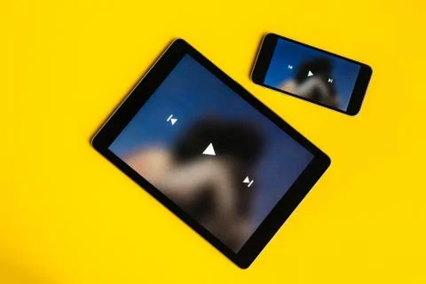 Close up play button interface on a modern gadget when watching videos 스톡 사진