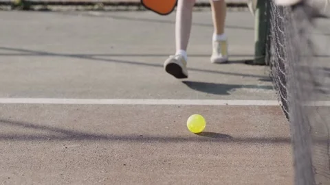 Close up player child playing pickleball game, pickleball yellow ball with Stock-Footage 229322835