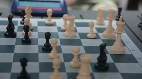 Close Up of Players Moving Pieces during Outdoor Chess Game Vidéo 341323689