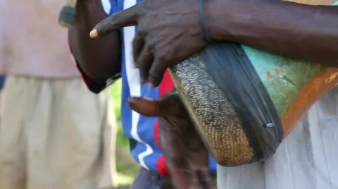 Close up playing African drums with hands Stock Footage 750114