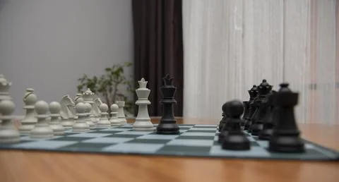 Close up, playing chess at home. Selective focus. Stock Photos