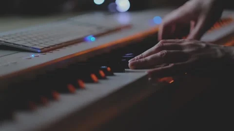 Close-Up Playing Digital Piano Keyboard in Home Studio Stock Footage 331905232