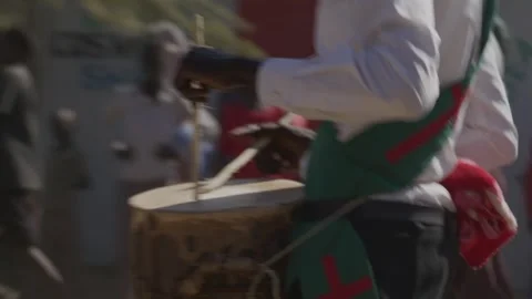 Close-Up Playing the Drum in the Street Parade  Video stock 243684126