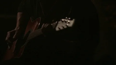 Close up playing guitar at night Stock Footage 71135684