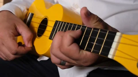 Close up playing ukulele Video stock 208881658
