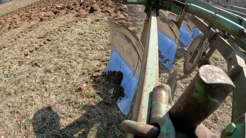 Close up of plow chisel when farmer raises the plow to turn into a new row Video stock 275166260