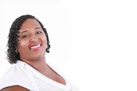 Close up of plus size black model smiling, copyspace on white Stock Photos