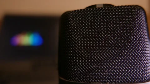 Close-up: podcast microphone in a studio. Sound levels on a computer screen Stock Footage 333018074