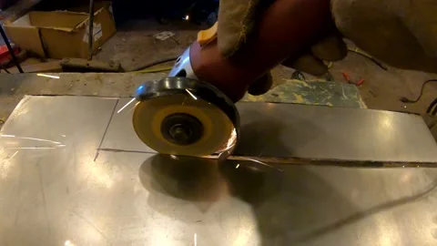 A Close Up Point of View of an Angle Grinder Cutting Metal 库存影片 156221656