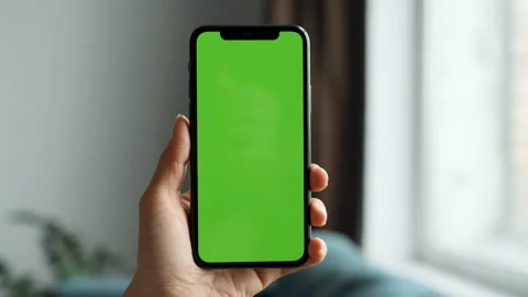 Close Up Point of View of Woman at Phone with Green Screen for Copy Space Stock Footage