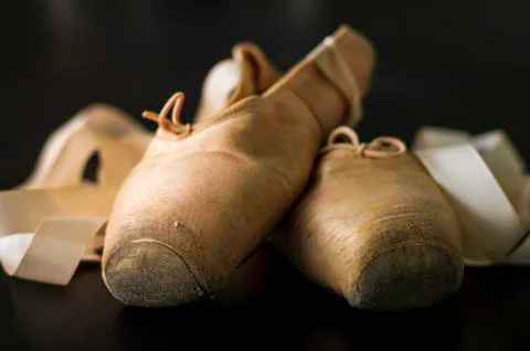 Close up in pointe shoe, short depth of field. Stock Photos