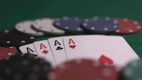 Close up of poker chips and playing cards of four aces Stock Footage 281487971