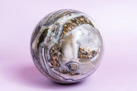 Close-up of a polished agate sphere showcasing its intricate patterns Stock Photos