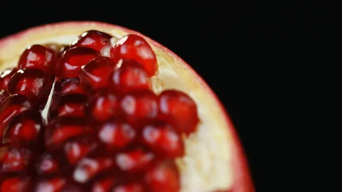 Close-up of an pomegranate cut in half. Stock Footage 101676769