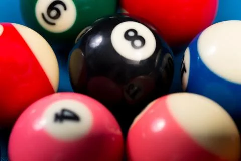 Close-up of pool balls on blue pool table Foto stock