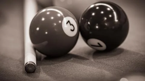 Close-up of a pool table with vibrant billiard balls, inviting a game of pr.. Stock Photos