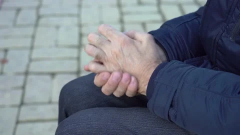Close-up of a poor elderly man's hand. Stock Footage 148100019