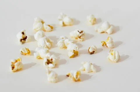 Close up of popcorn on a withe background Stock Photos