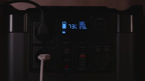 Close up of portable power station LCD screen showing output wattage and ba.. Stock Footage 336235854