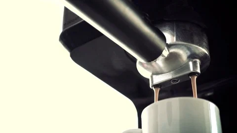 Close up of portafilter coffee machine slowmotion spilling 3 1 Video stock 93218258