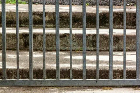 Close up of portion of galvanized metal gate Stock Photos