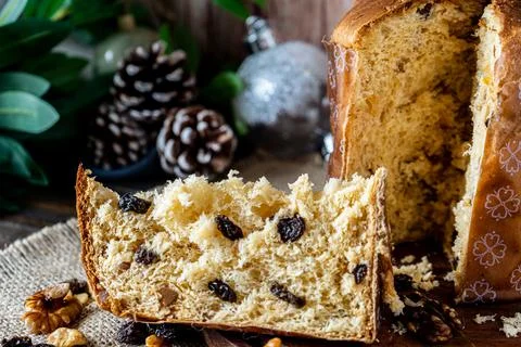 Close-up of a portion of sweet bread or Italian panettone with dried fruits i Stock Photos