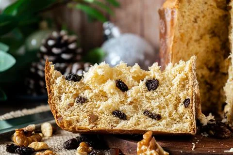 Close-up of a portion of sweet bread or Italian panettone with dried fruits i Stock Photos
