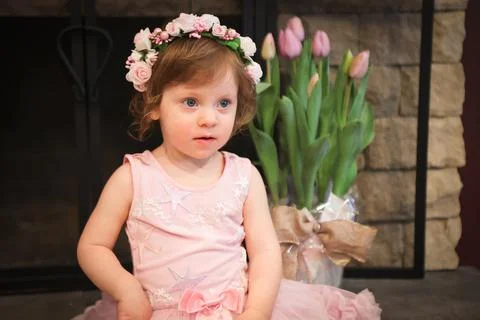 Close Up Portrait, 2 Years Old Toddler Girl with Big Blue Eyes, in light Pink Dr Stock Photos