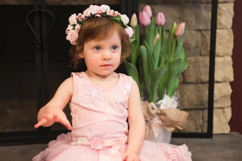 Close Up Portrait, 2 Years Old Toddler Girl with Big Blue Eyes, in light Pink Dr Stock Photos