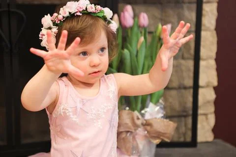 Close Up Portrait, 2 Years Old Toddler Girl with Big Blue Eyes, in light Pink Dr Stock Photos