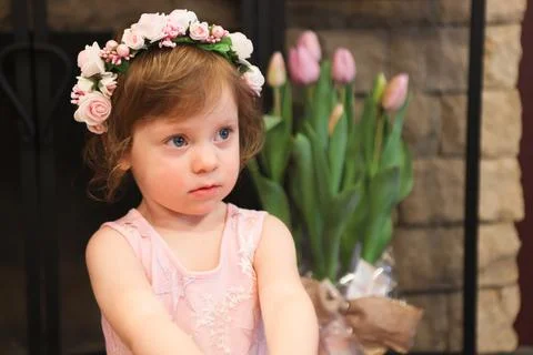 Close Up Portrait, 2 Years Old Toddler Girl with Big Blue Eyes, in light Pink Dr Stock Photos