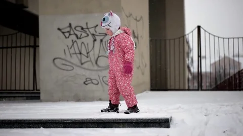 Close-Up Portrait of 3 Year Old Funny Girl Having Fun and Playing Outdoor in Stock Footage 71795693