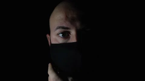 Close up portrait. 4k, young man wears medical mask Video stock 145453177
